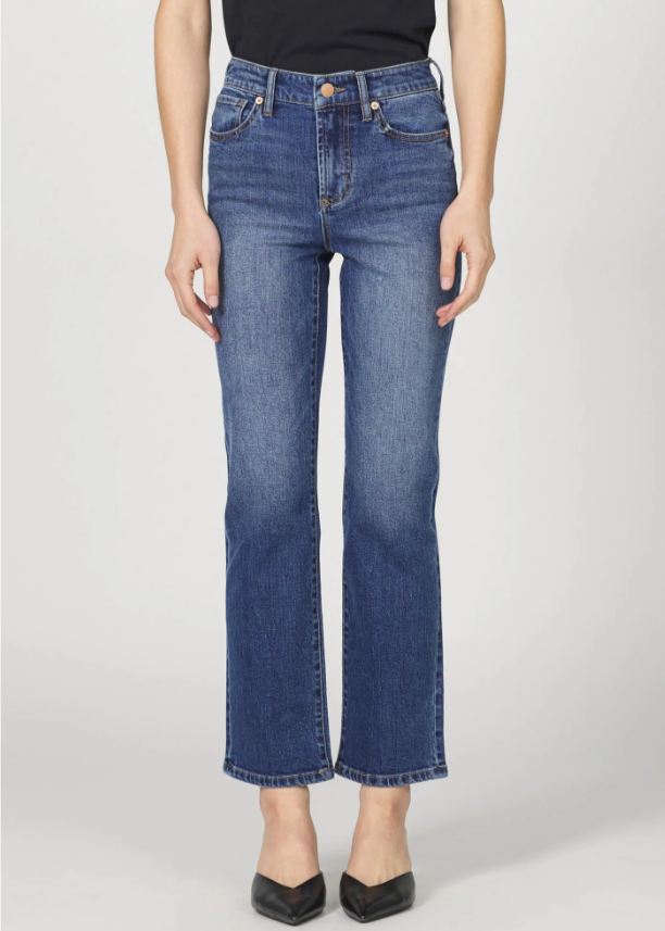 Person wearing blue jeans on a white background